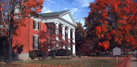 photo of Halifax County Virginia court house with Fall colored leaves